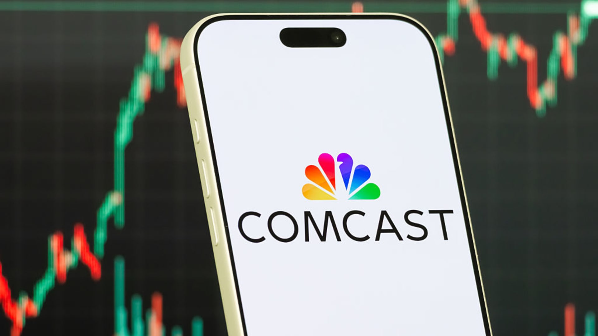 A Comcast sign outside the company's Philadelphia headquarters; the cable giant is splitting into two public companies.