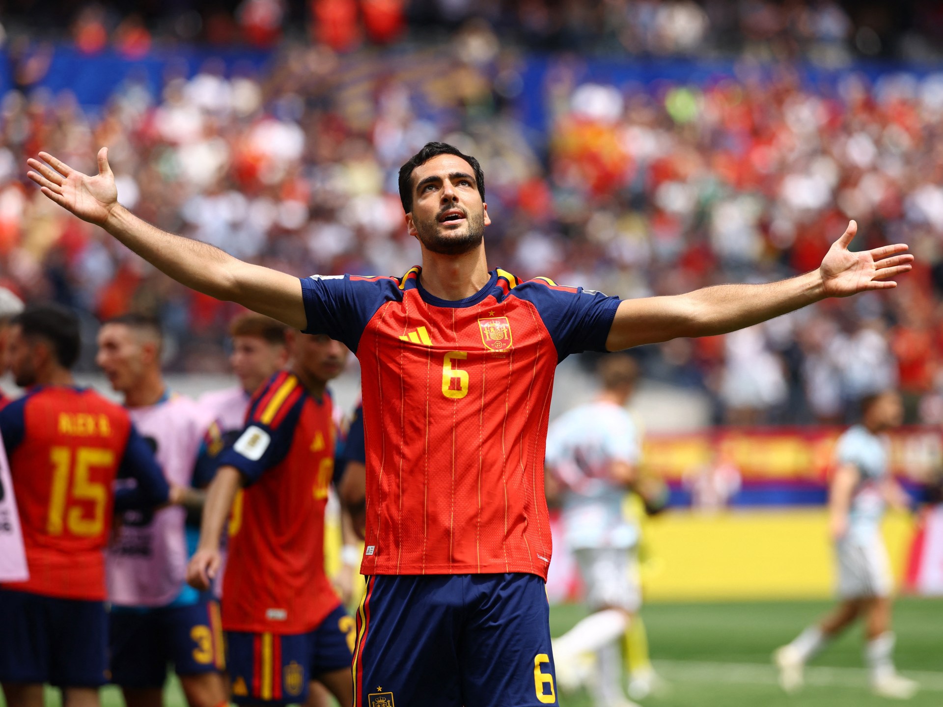 Spain celebrate semifinal win over Belgium