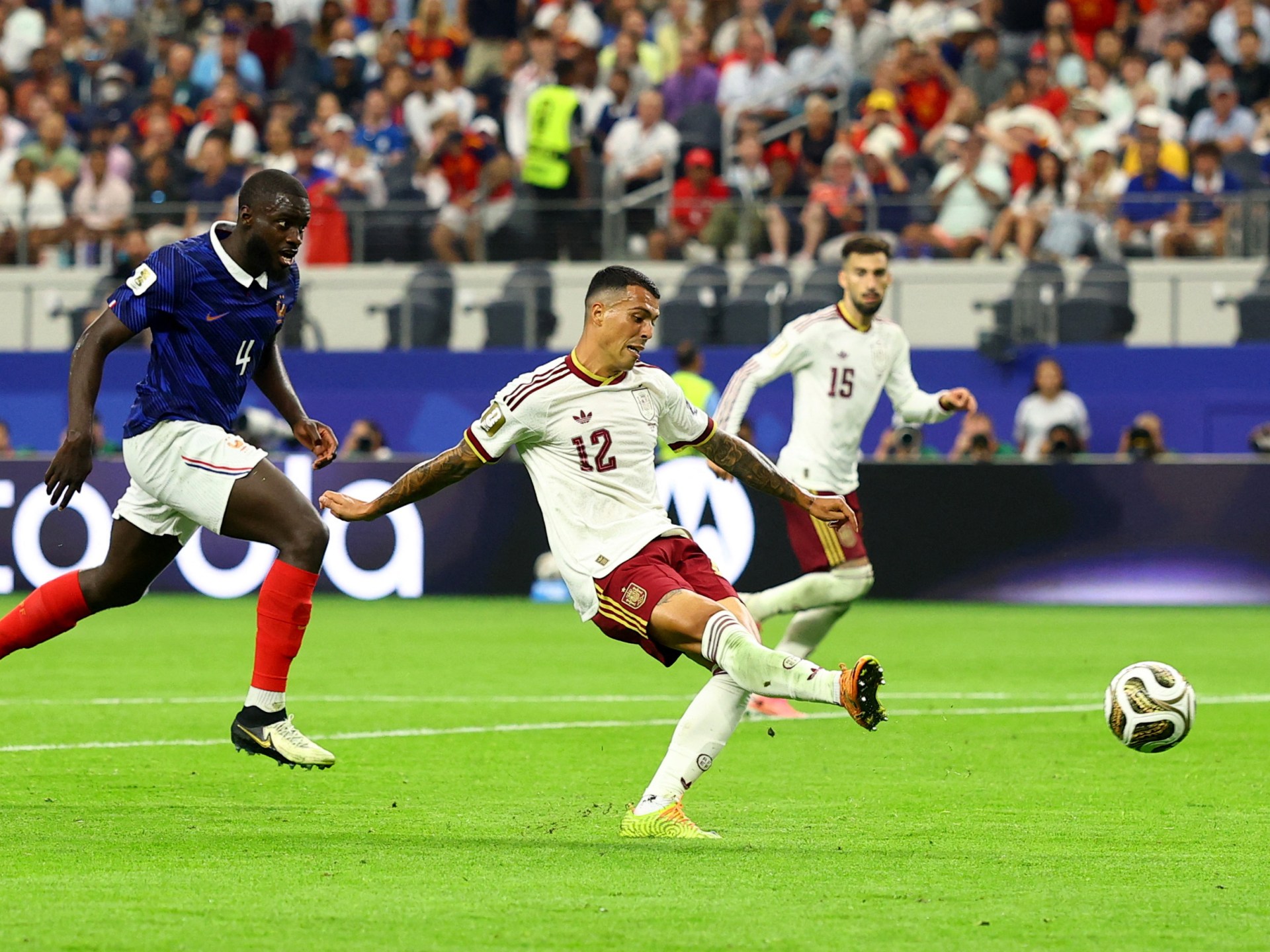 Spain players celebrate after beating France to reach the 2026 World Cup final