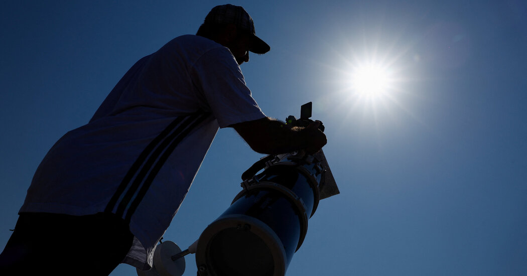 Tourists gather in Iceland hours before the total solar eclipse