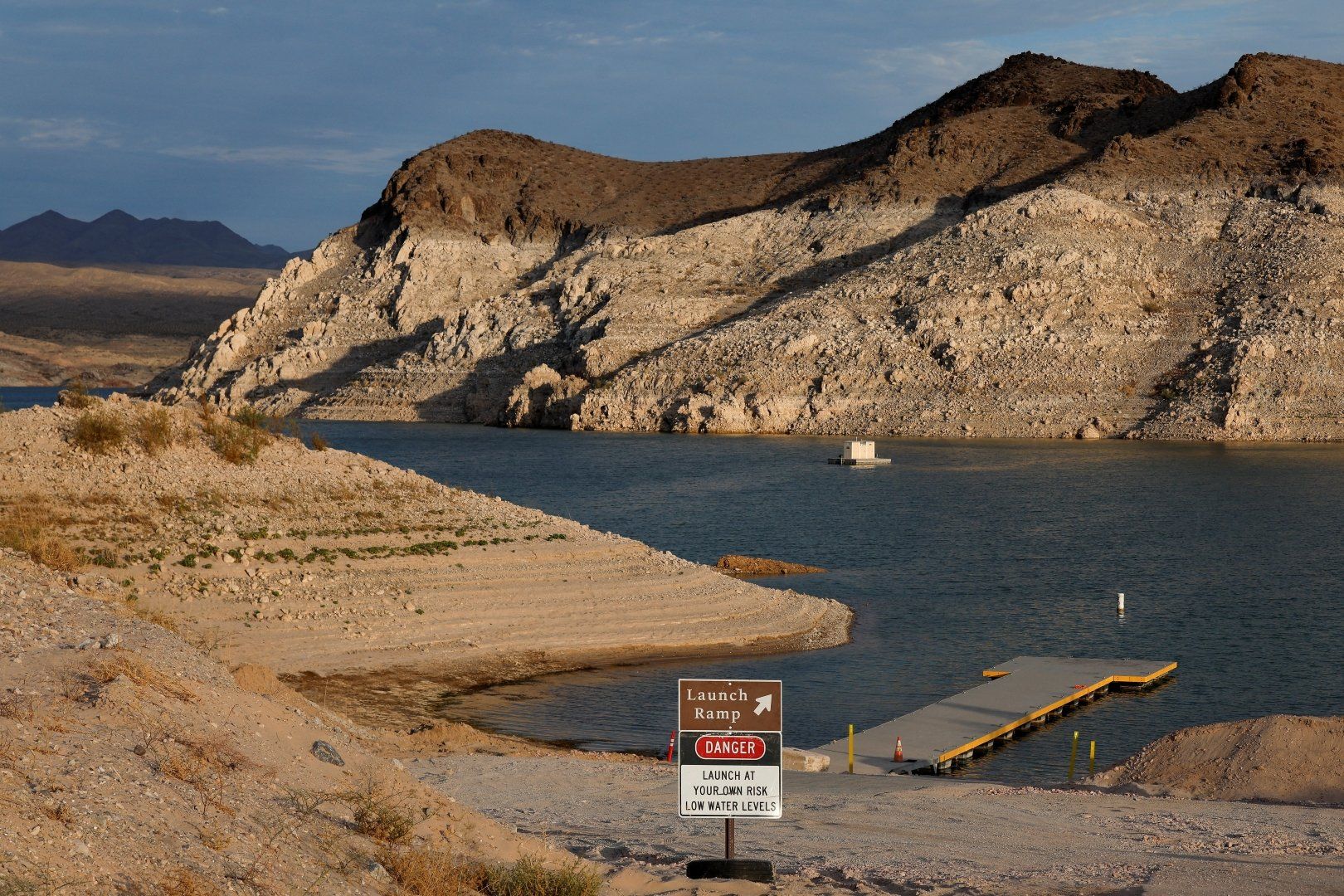 Lake Mead reservoir at record low water level showing exposed rock formations
