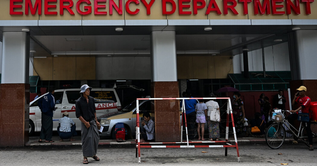 Medical personnel treating cholera patients in Yangon