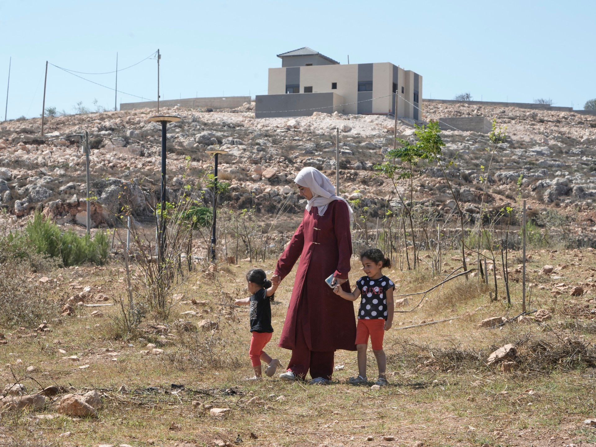 Israeli roadblock and gate at West Bank settlement
