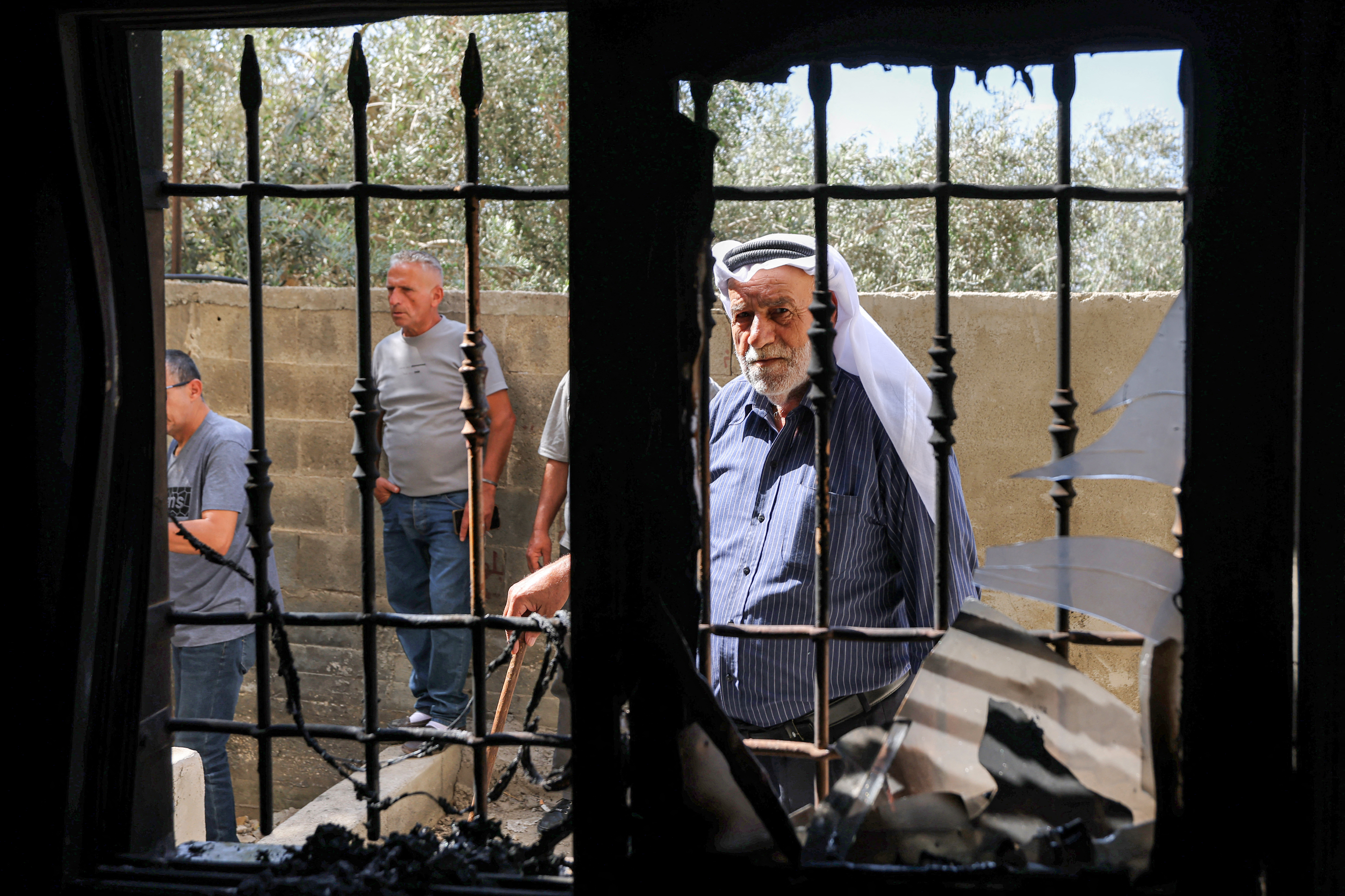 Israeli forces and settlers at West Bank mosque site