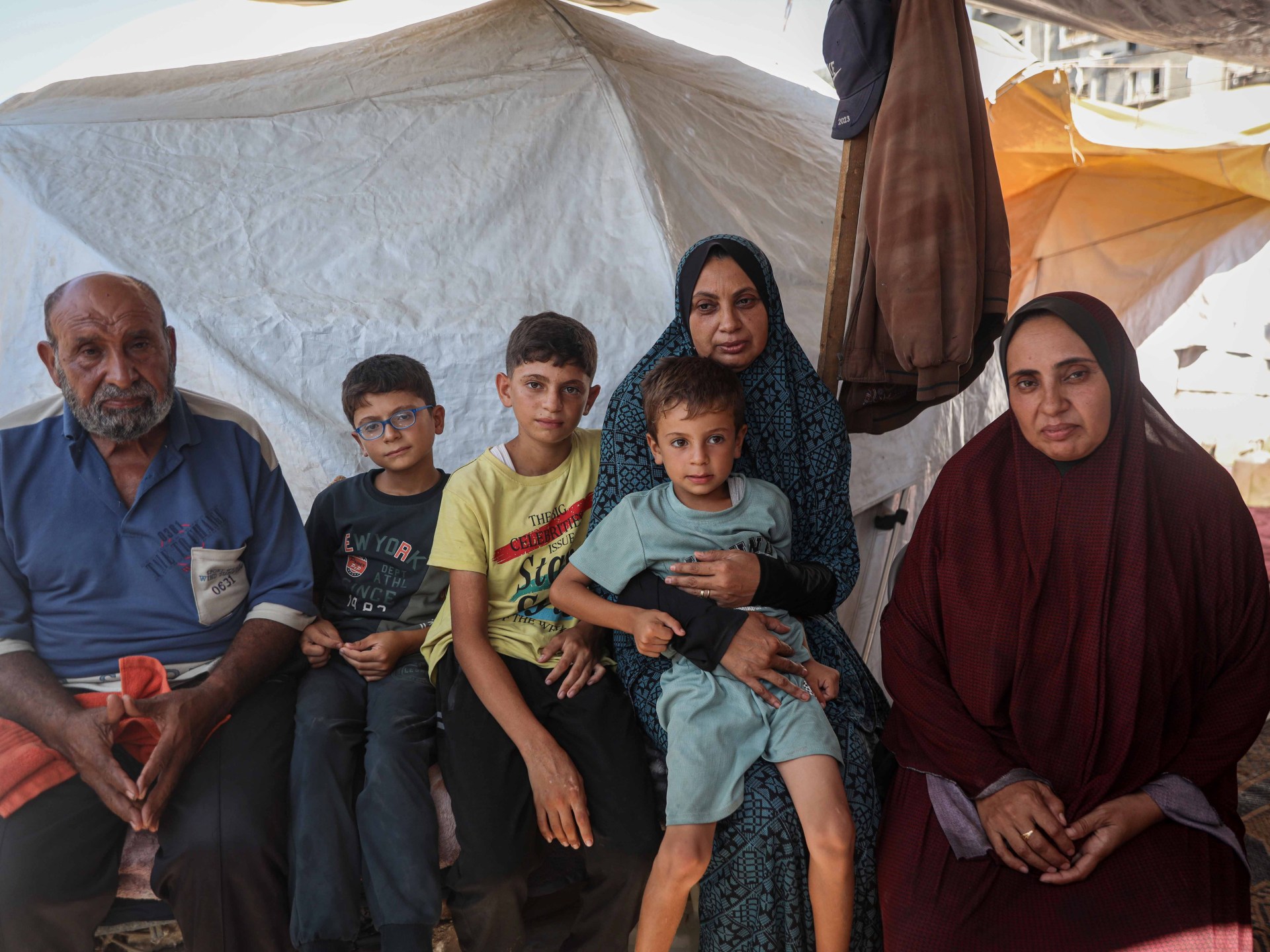 Palestinians mourning and struggling with food scarcity in Gaza