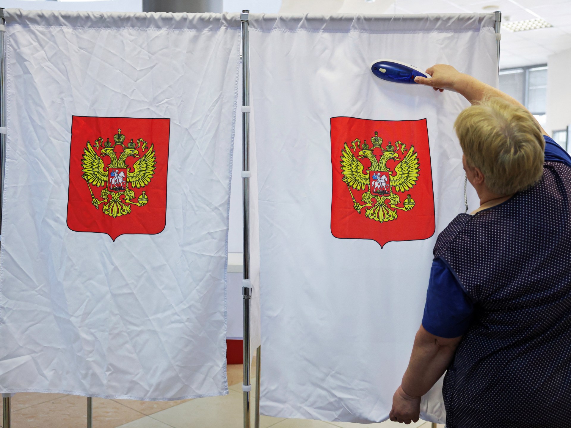 Russian election ballot and Duma building