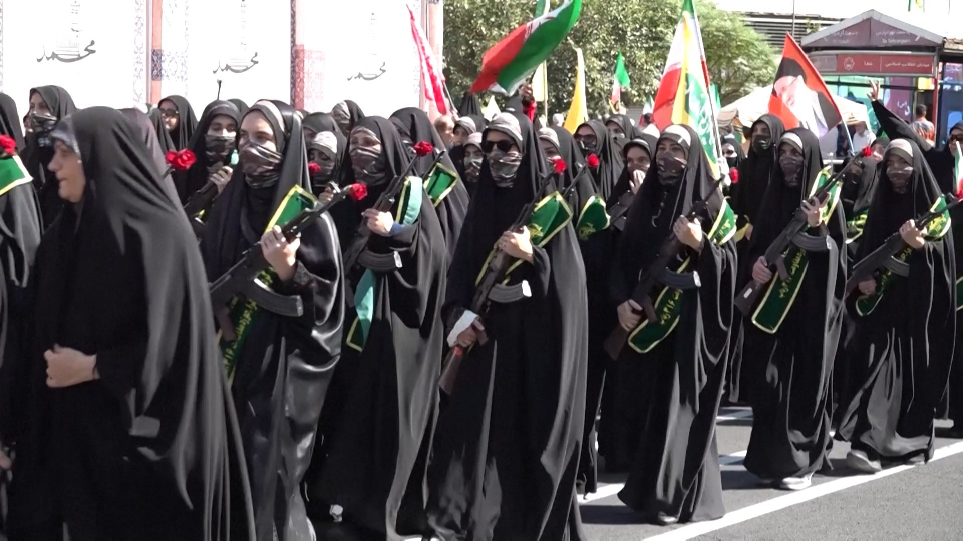 Iranian military mobilization event in Tehran featuring armed forces and Shaheed drones