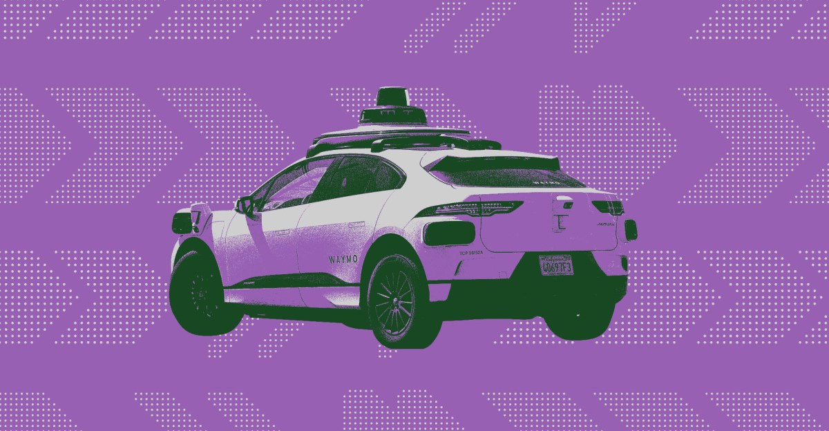 Waymo driverless taxi operating in urban environment