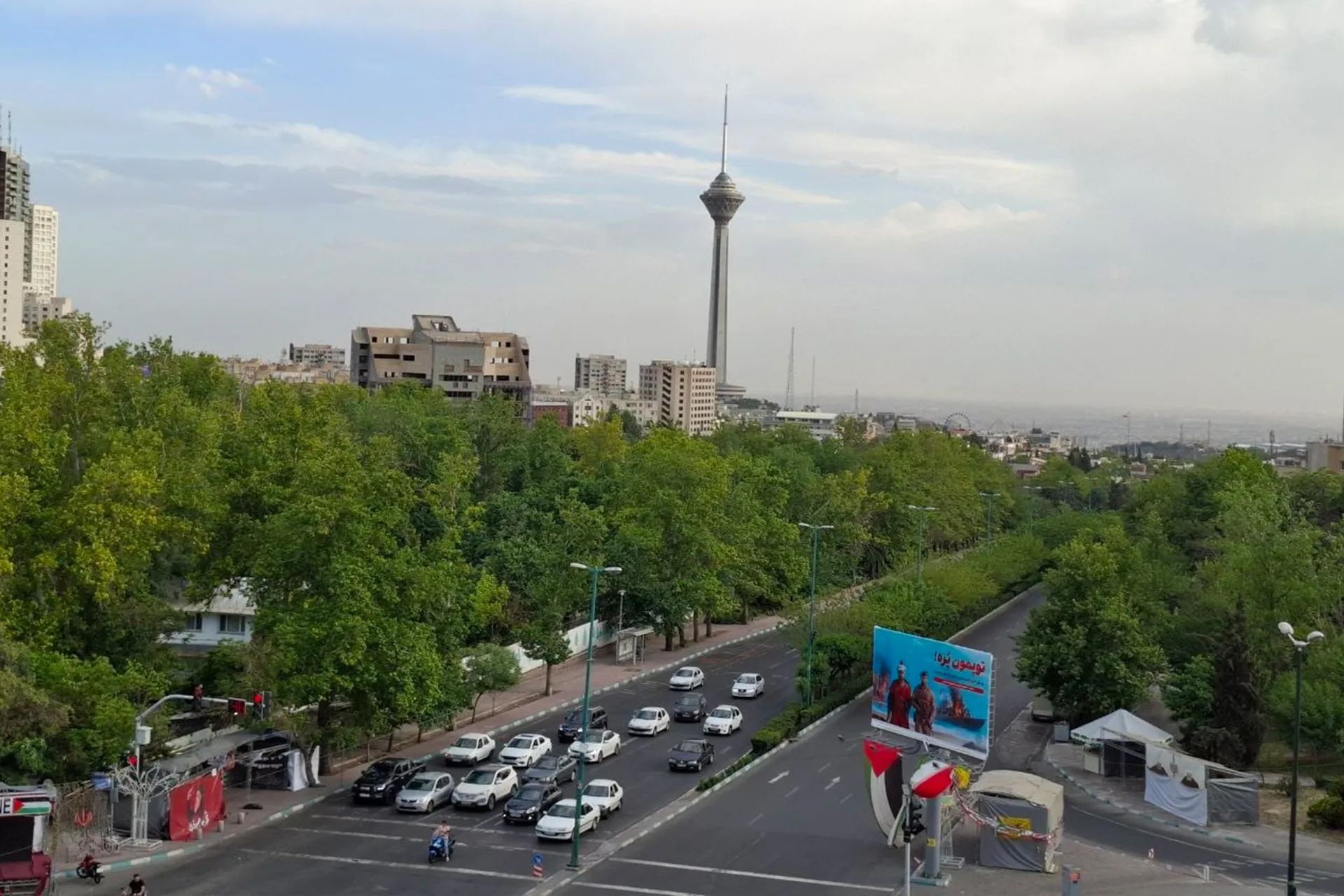 Iranian shoppers stock food supplies