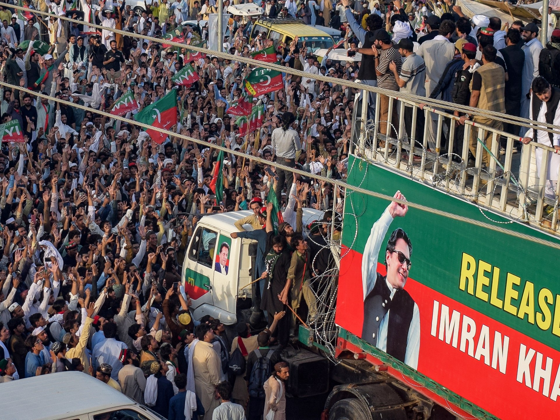 Imran Khan supporters march toward Islamabad