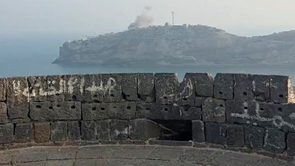 Smoke rising from targeted compound in Aden, Yemen