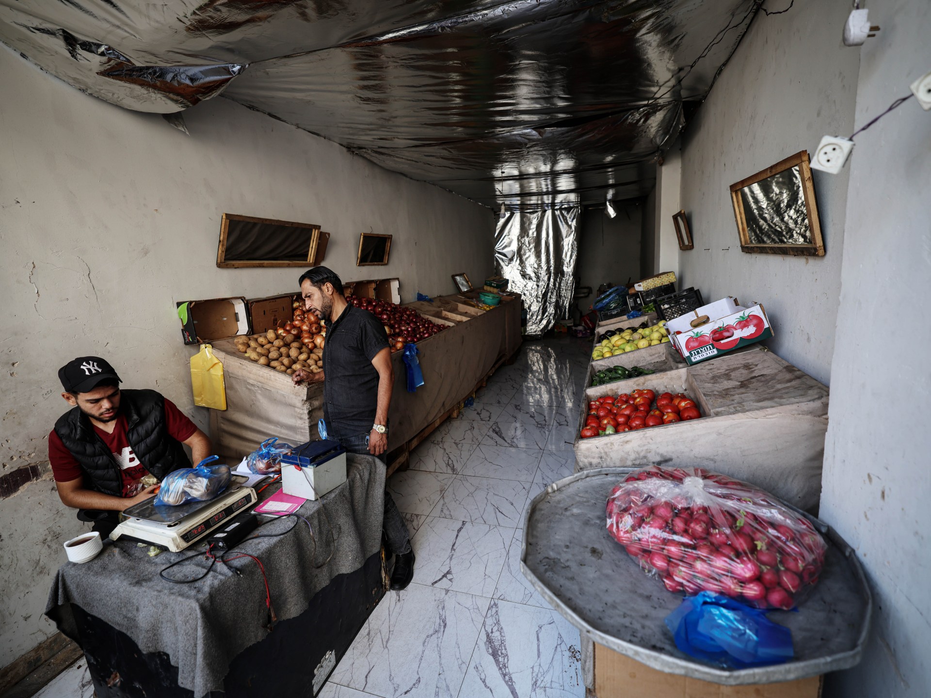 Market scene in Gaza showing economic impact